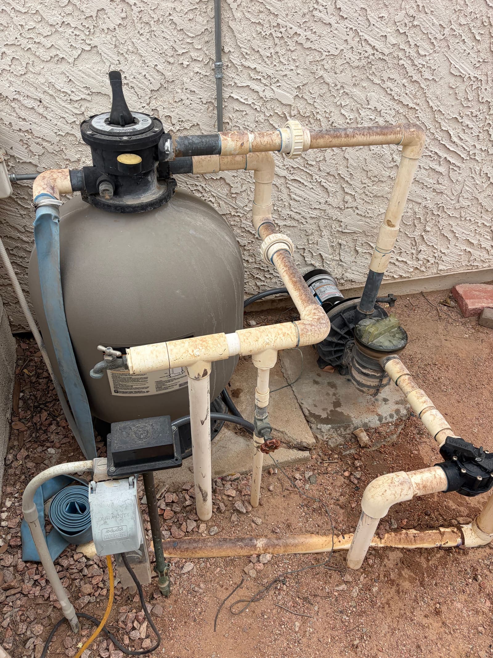 Leaf vacuum working across a pool floor during a one-time cleanup